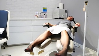 A Lustful Beautician Pleasuring A Client'S Feet